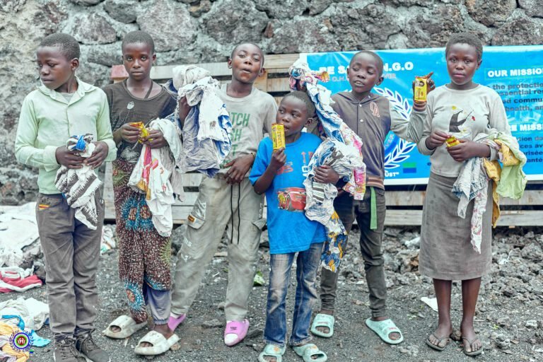 Young children in the camp after getting the clothes