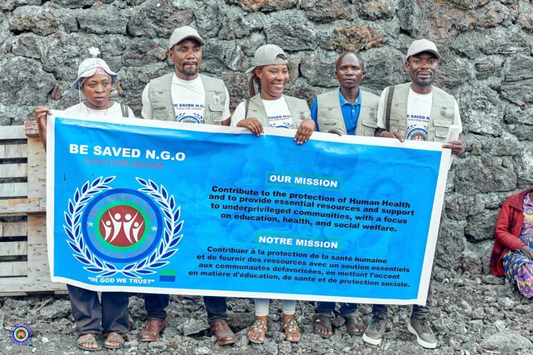 Bsaved team holding the organisation banner in Goma_DRC