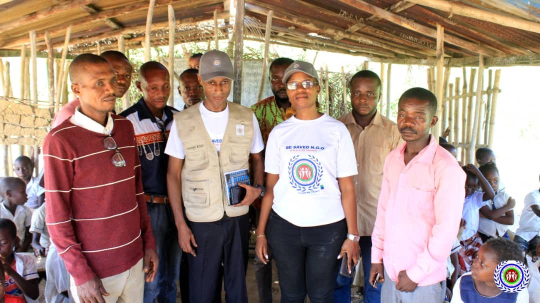 School teachers in a photo with Bsaved team members