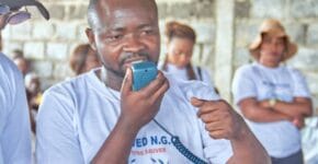 A team membershare words to children during the event in Goma 3