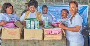 Besaved team serving the school materials to the Children in Goma 3
